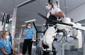 Robotics and spinal stimulation restore movement in paralysis